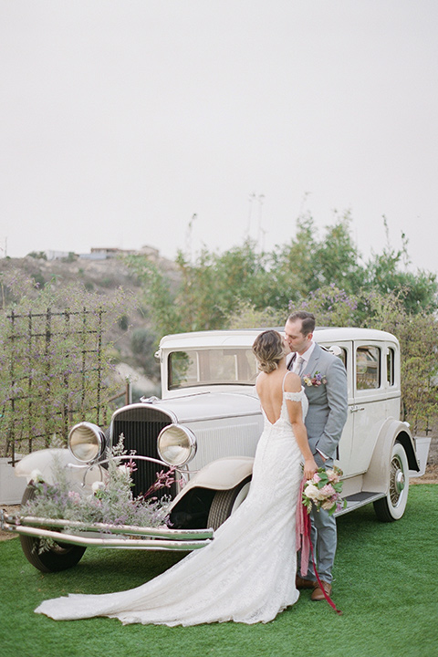  hilltop garden wedding with springtime details – by the car