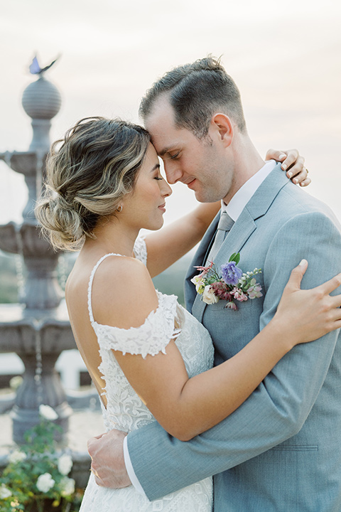  hilltop garden wedding with springtime details – couple close 