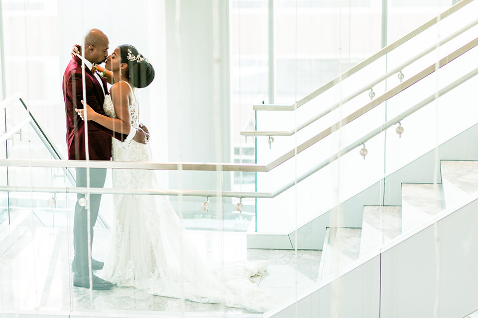  glitz and glam shoot at the Hotel Indigo – couple by the stairs 