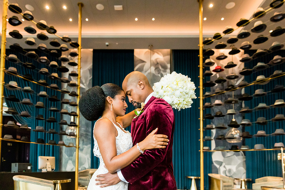  glitz and glam shoot at the Hotel Indigo – couple touching heads 