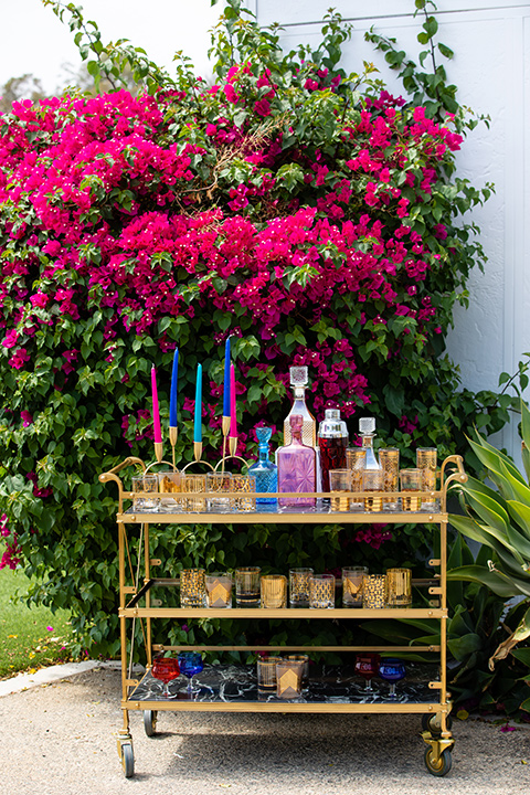  bright colorful wedding with the groom in a green velvet tuxedo - bar 