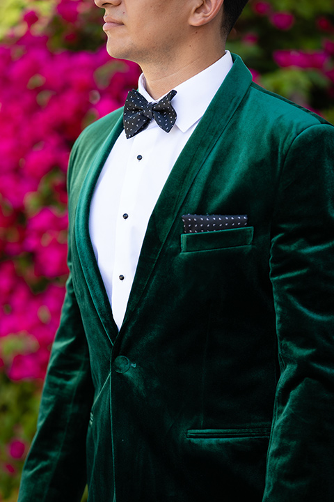  bright colorful wedding with the groom in a green velvet tuxedo - groom 