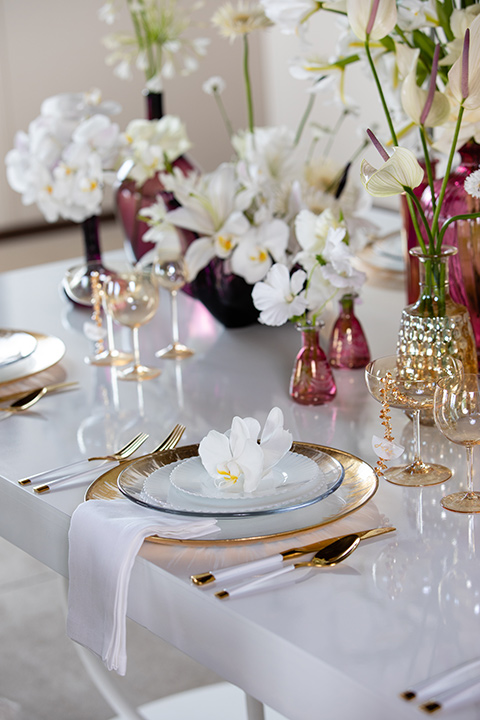  bright colorful wedding with the groom in a green velvet tuxedo - flatware 