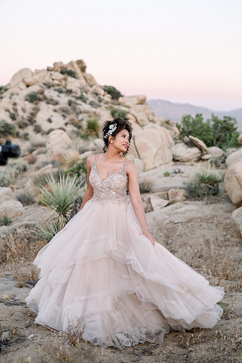  Iridescent dreams in the desert with the bride in a pink dress and the groom in a rose suit - bride 