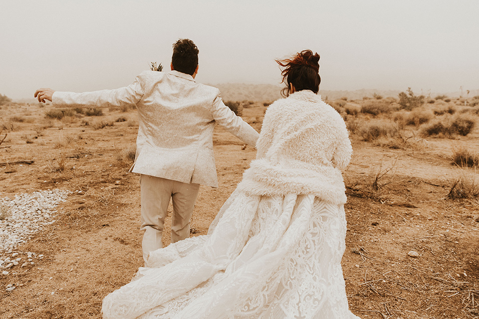  Jillian Rose Reed’s fabulous desert boho wedding –couple running 