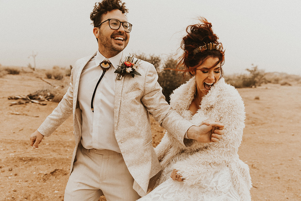  Jillian Rose Reed’s fabulous desert boho wedding –couple jumping 
