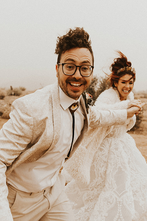  Jillian Rose Reed’s fabulous desert boho wedding – couple running