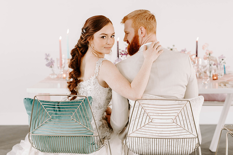  pastel and gold wedding with celestial décor – and the groom in a tan suit and a gold velvet tuxedo – sweetheart table 