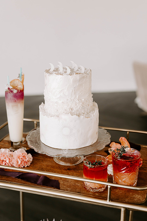  pastel and gold wedding with celestial décor – and the groom in a tan suit and a gold velvet tuxedo – cake 