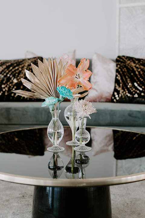  pastel and gold wedding with celestial décor – and the groom in a tan suit and a gold velvet tuxedo – couple with balloons 