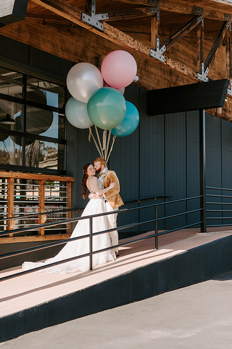  pastel and gold wedding with celestial décor – and the groom in a tan suit and a gold velvet tuxedo – ceremony tan 