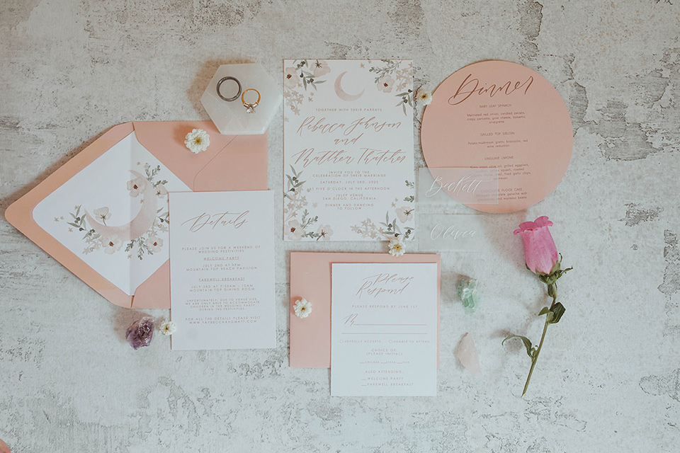  pastel and gold wedding with celestial décor – and the groom in a tan suit and a gold velvet tuxedo – invitations 