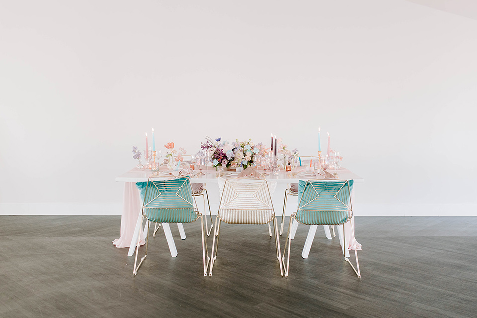  pastel and gold wedding with celestial décor – and the groom in a tan suit and a gold velvet tuxedo – tables 