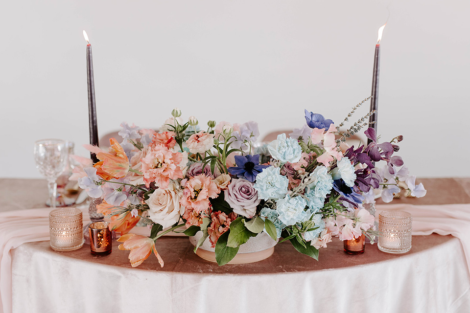  pastel and gold wedding with celestial décor – and the groom in a tan suit and a gold velvet tuxedo – tables 