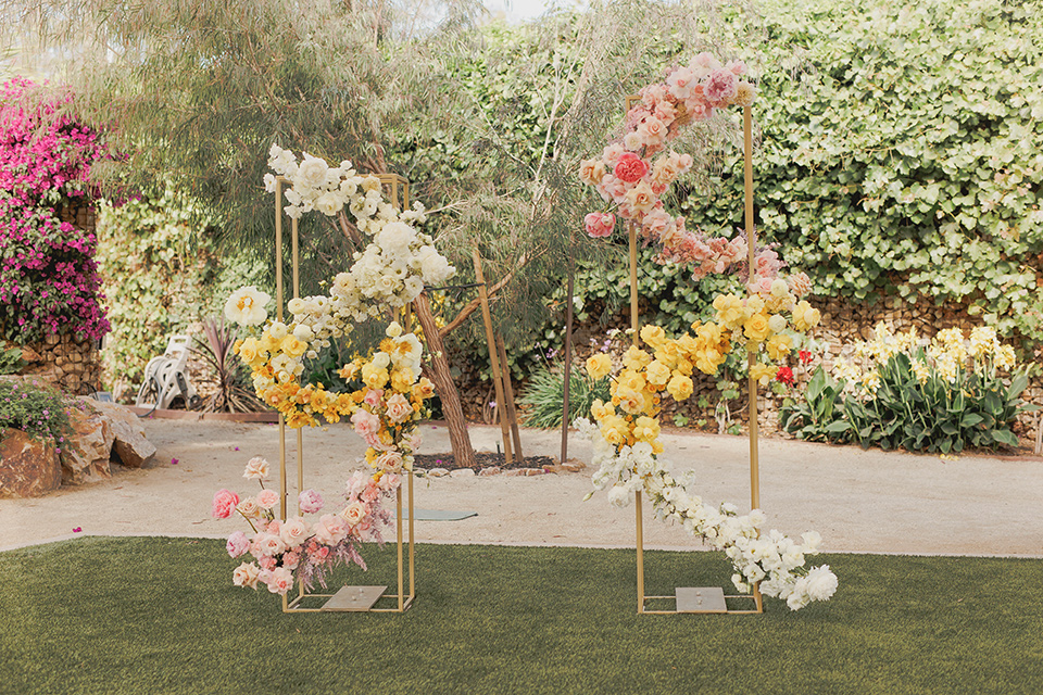  princess inspired wedding with touches of pink and dogs – ceremony arch decor 