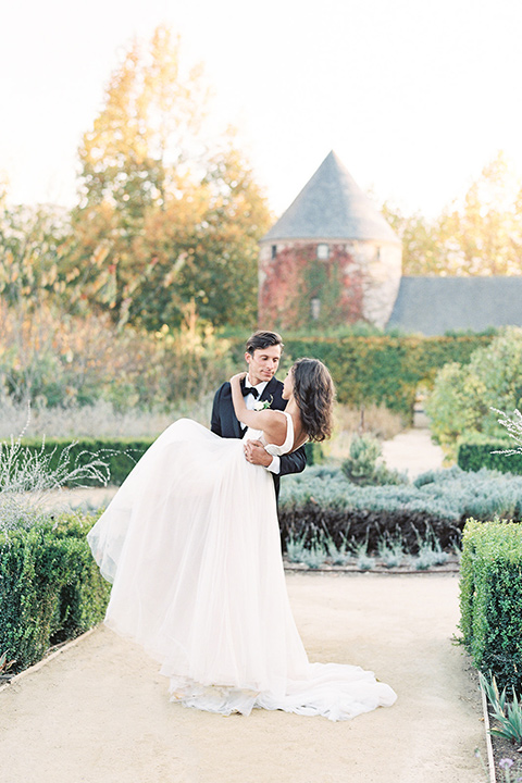  fall wedding at kestrel park – couple in garden 
