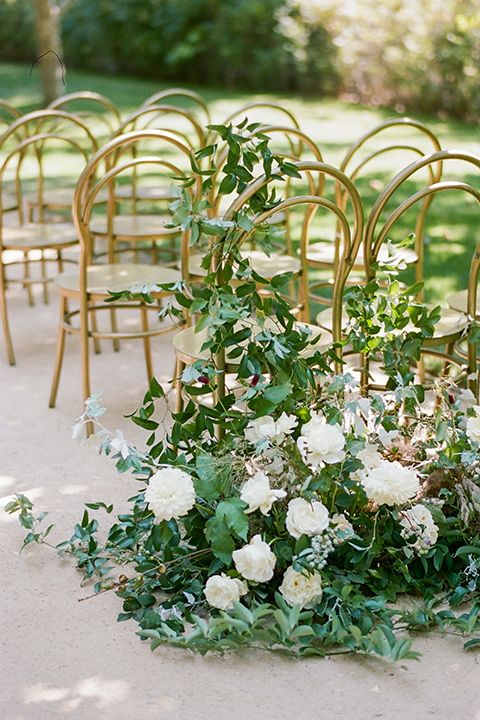  Kestrel Park wedding with the groom in a tan suit and the bride in an ivory wedding gown with a plunging neckline 