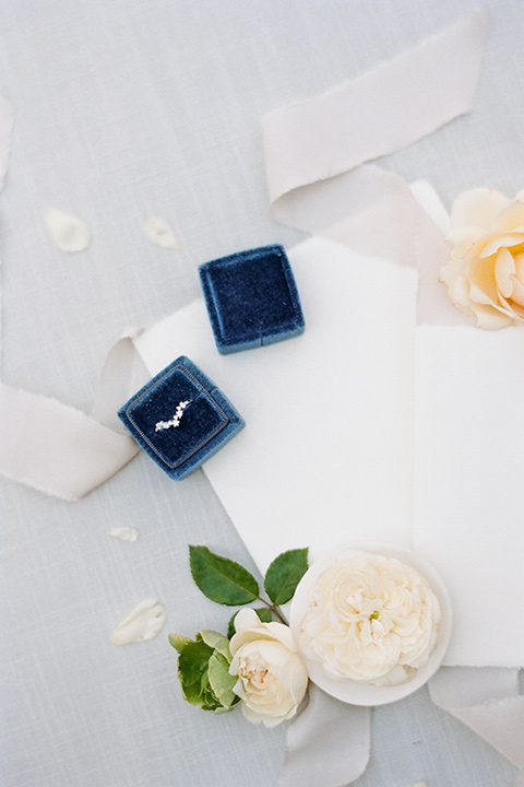  Kestrel Park wedding with the groom in a tan suit and the bride in an ivory wedding gown with a plunging neckline 