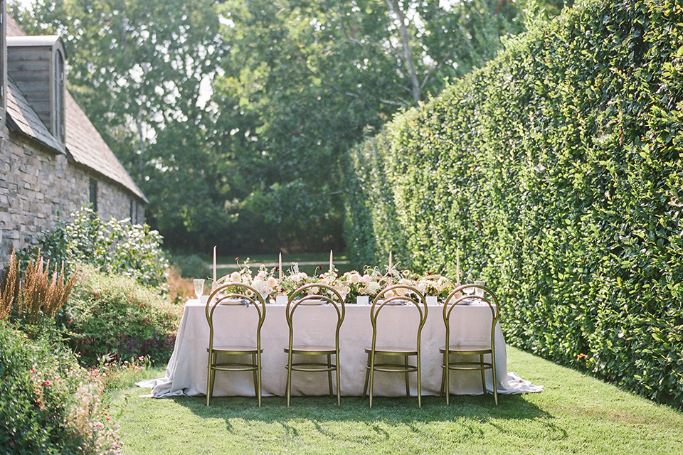  Kestrel Park wedding with the groom in a tan suit and the bride in an ivory wedding gown with a plunging neckline 