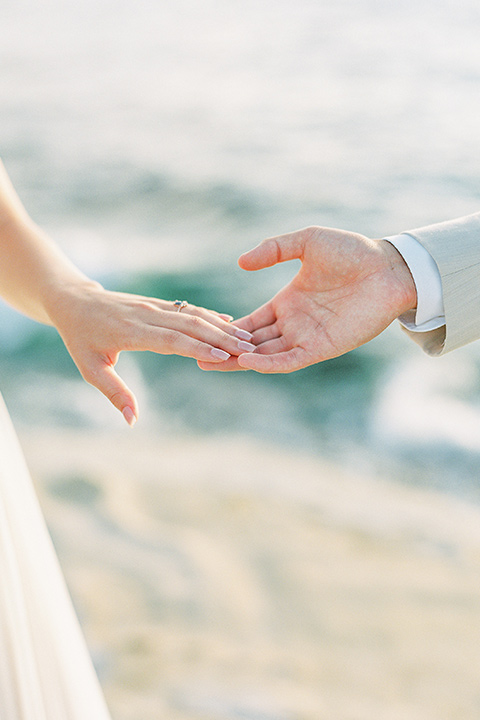  la jolla wedding on the beach with the groom in a tan suit – couple looking at the beach 