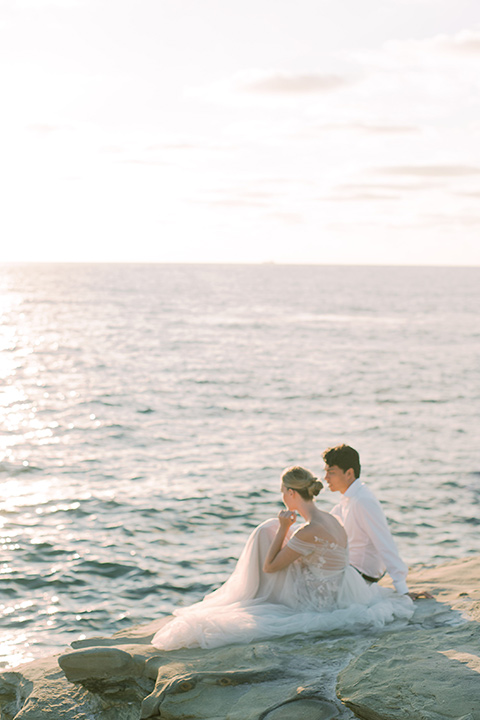  la jolla wedding on the beach with the groom in a tan suit – couple looking at the beach 