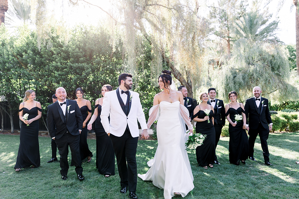  black and white wedding design with touches of greenery – group image 