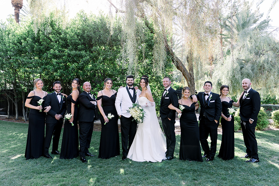  black and white wedding design with touches of greenery – group image 