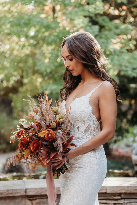  boho autumn wedding with the groom and groomsmen in a green suit – bride