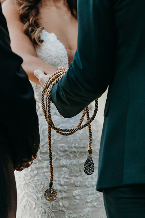  boho autumn wedding with the groom and groomsmen in a green suit – with the horses