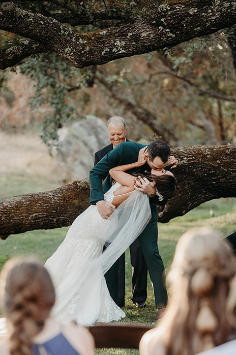  boho autumn wedding with the groom and groomsmen in a green suit – cheese platter 