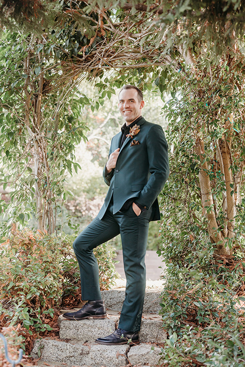  boho autumn wedding with the groom and groomsmen in a green suit – groom 