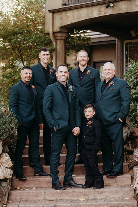  boho autumn wedding with the groom and groomsmen in a green suit – groom 