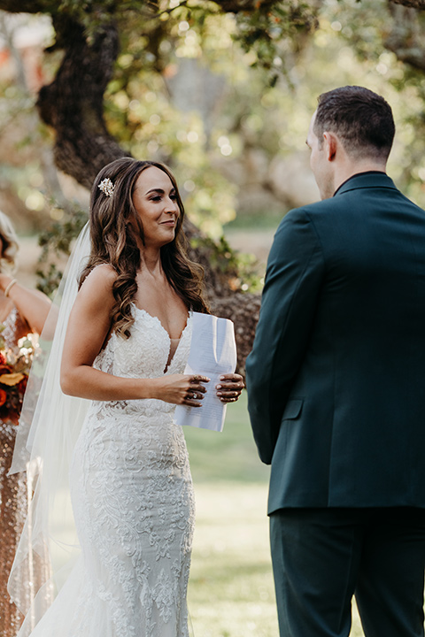  boho autumn wedding with the groom and groomsmen in a green suit – groom 