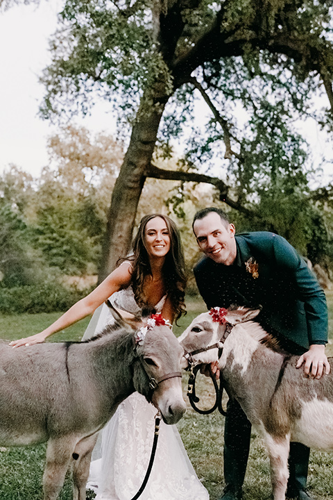  boho autumn wedding with the groom and groomsmen in a green suit – with the horses