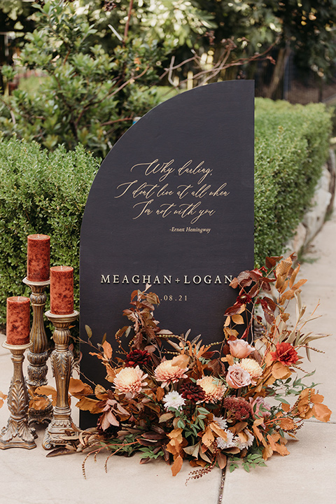  boho autumn wedding with the groom and groomsmen in a green suit – table florals