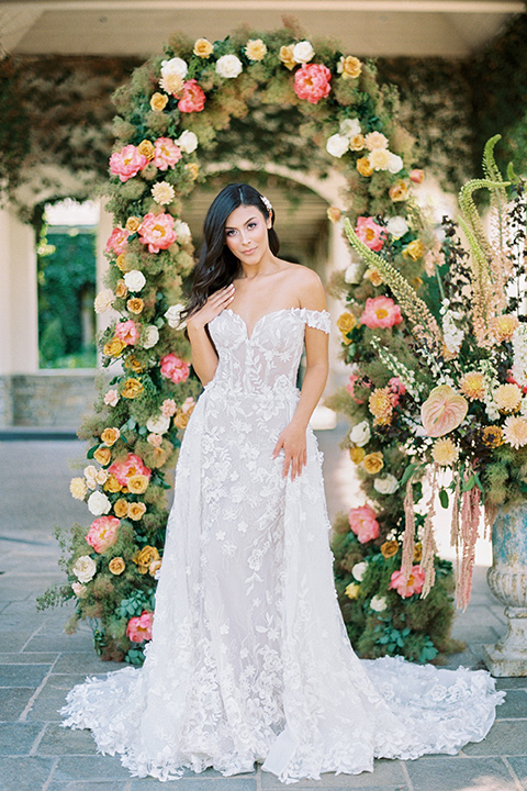  old world garden wedding design with yellow and pink flowers and the groom in a navy shawl tuxedo – bride 