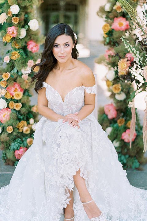  old world garden wedding design with yellow and pink flowers and the groom in a navy shawl tuxedo – ceremony arch 