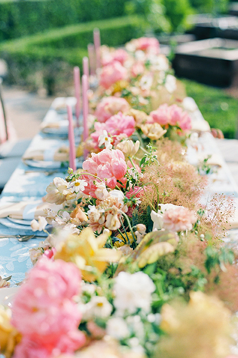  old world garden wedding design with yellow and pink flowers and the groom in a navy shawl tuxedo – ceremony arch 