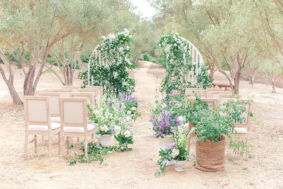  Perfectly Provincial Wedding with baby animals and the bride in a ballgown and the groom in a light blue suit 