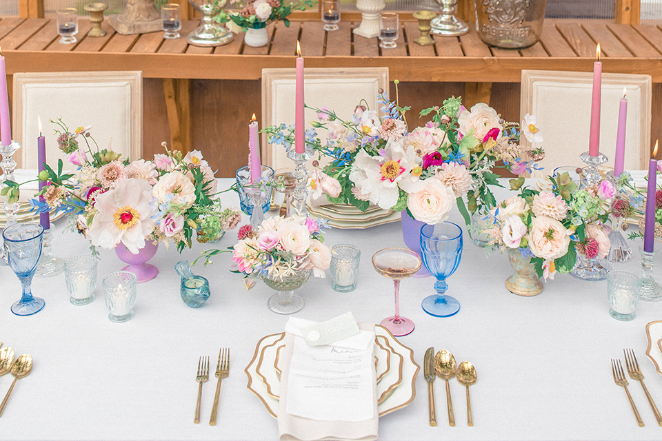  Perfectly Provincial Wedding with baby animals and the bride in a ballgown and the groom in a light blue suit 