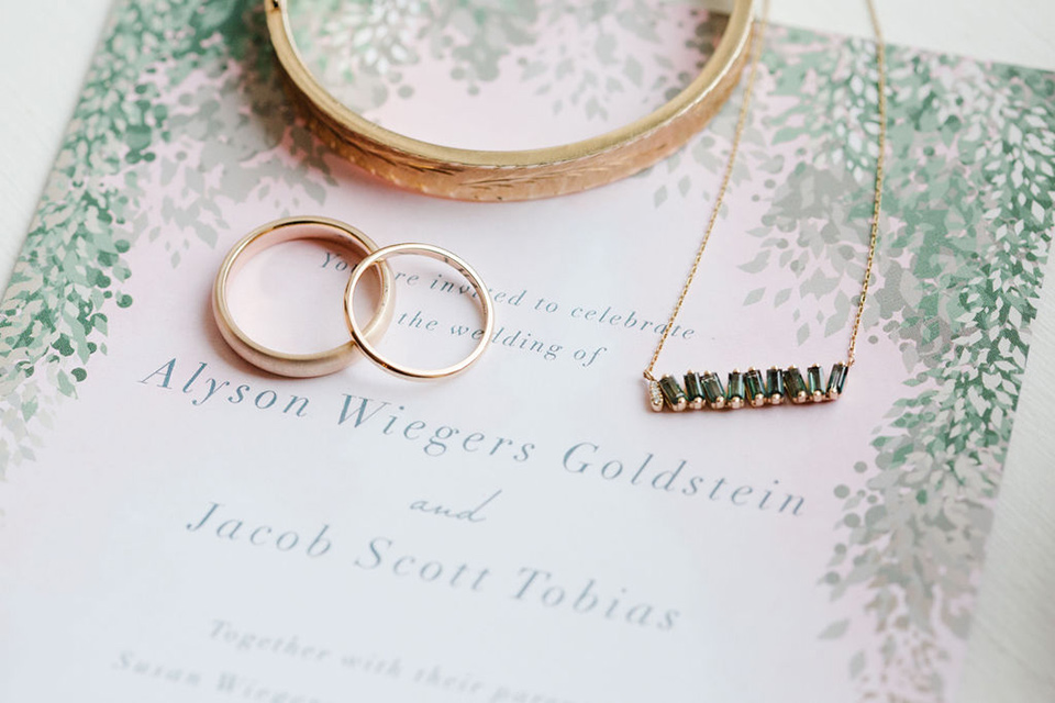  a downtown wedding at the cultural center with the groom and groomsmen in green suits and the bridesmaids in blush dresses and the bride in an a-line gown- invitations and jewelry