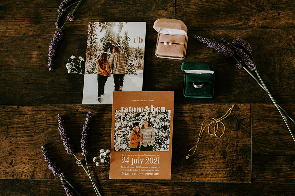  rustic boho wedding with warm colors and the bride in an off the shoulder gown and the groom in a caramel suit 