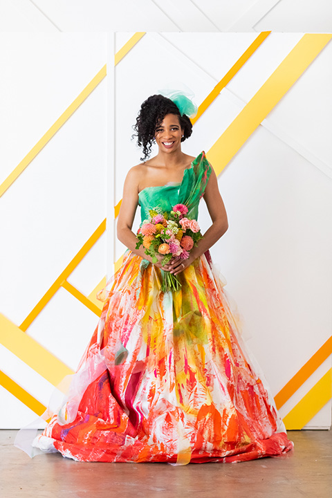  colorful wedding at the forme in LA with a gold velvet jacket and a colorful gown 