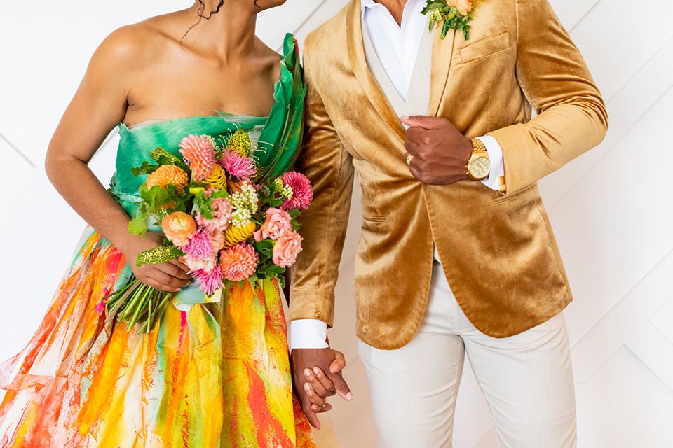  colorful wedding at the forme in LA with a gold velvet jacket and a colorful gown 