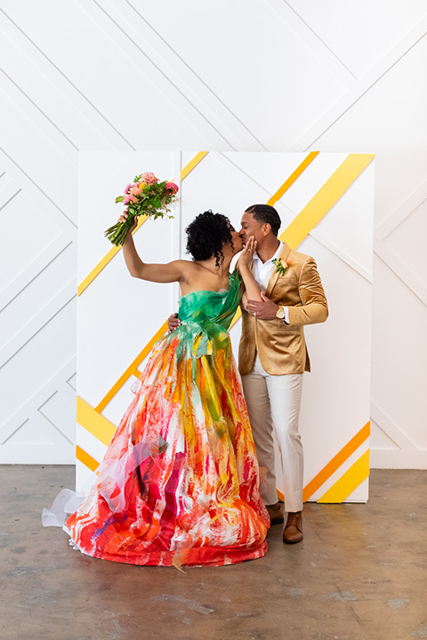  colorful wedding at the forme in LA with a gold velvet jacket and a colorful gown