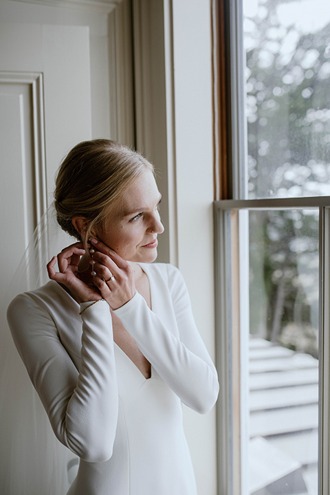  lizzie and tommys wedding on the beach with neutral colors and a gold velvet jacket – bride 