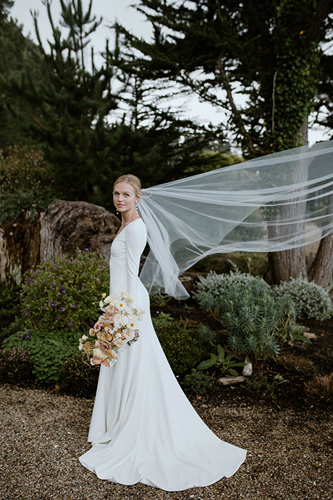  lizzie and tommys wedding on the beach with neutral colors and a gold velvet jacket – bride 