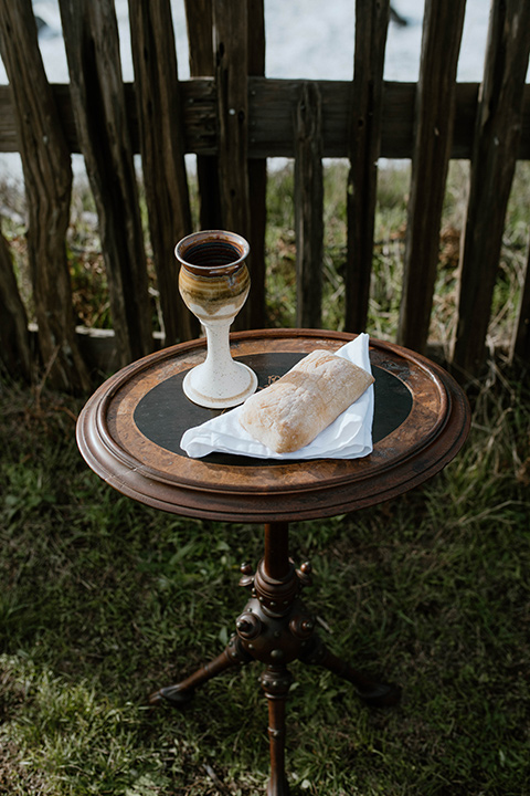  lizzie and tommys wedding on the beach with neutral colors and a gold velvet jacket – bride 