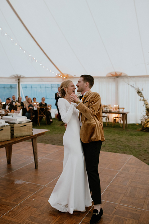  lizzie and tommys wedding on the beach with neutral colors and a gold velvet jacket – bride 