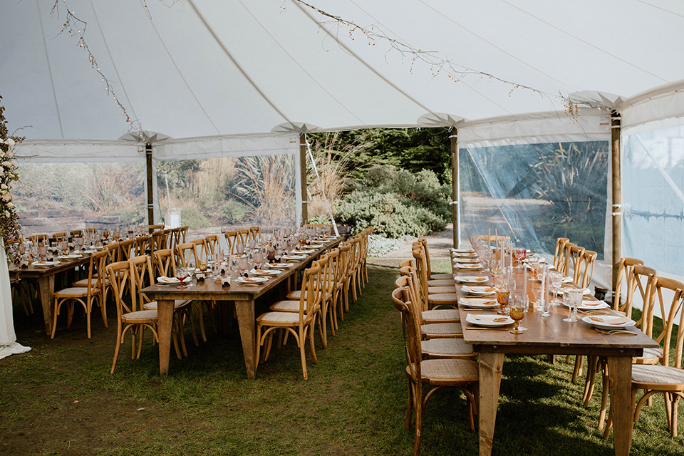  lizzie and tommys wedding on the beach with neutral colors and a gold velvet jacket – reception